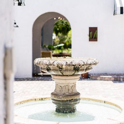 Take Instagram snaps beside the ornate fountain