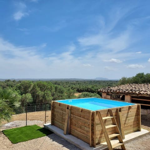 Spend the evenings chilling in the swimming pool with views of lush countryside 