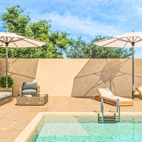 Laze on loungers by the your private pool before a refreshing dip