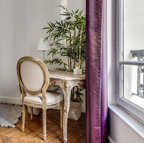 Get some work done at the small desk in the bedroom