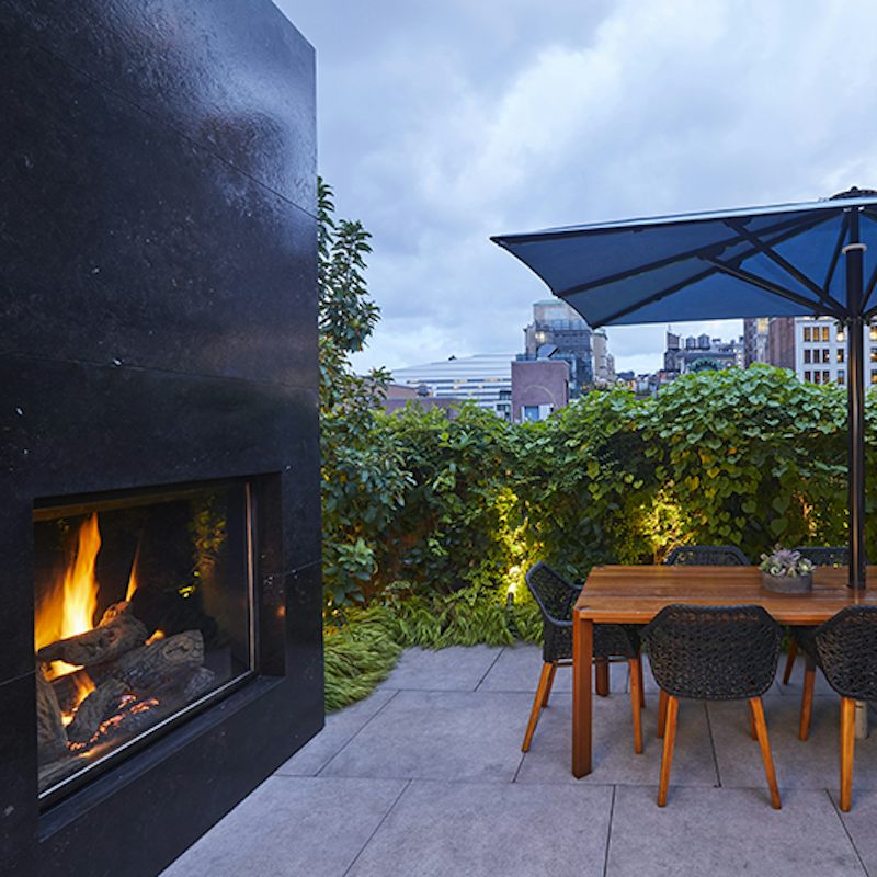 Dine alfresco beside the roaring fire
