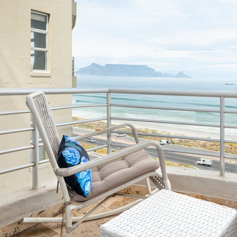 Kick back on the balcony with a glass of regional wine and watch the tide roll in