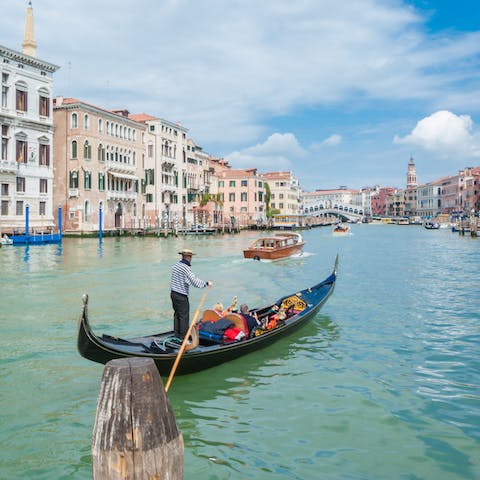 Head over to the Grand Canal in two minutes on foot and see the city from the comfort of a gondola
