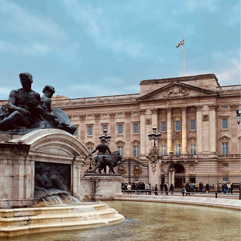 Visit Buckingham Palace, just a thirteen-minute walk away