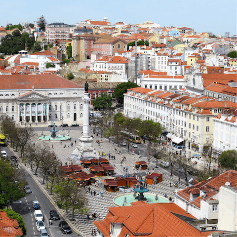 Find yourself a sunny spot in Rossio Square for lunch, just a thirteen-minute amble away