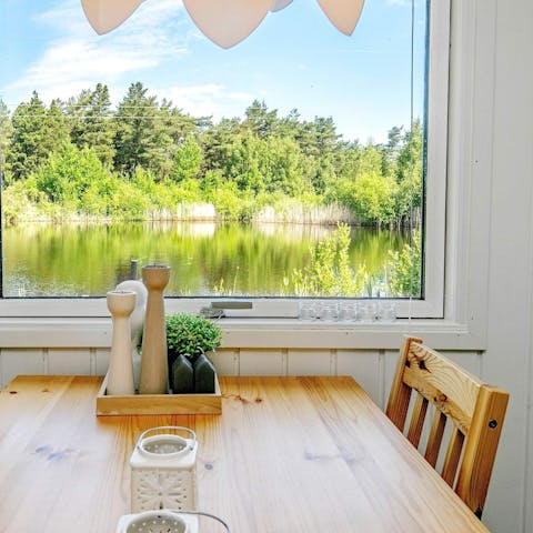 Eat dinner as you admire the serene views across the lake