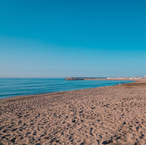 Dip your toes in the Playa Guadalmina waters, a reasonable walk away