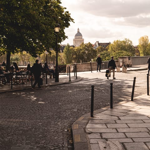 Stroll across the Seine to Île St-Louis – a lovely spot for a crêpe and coffee