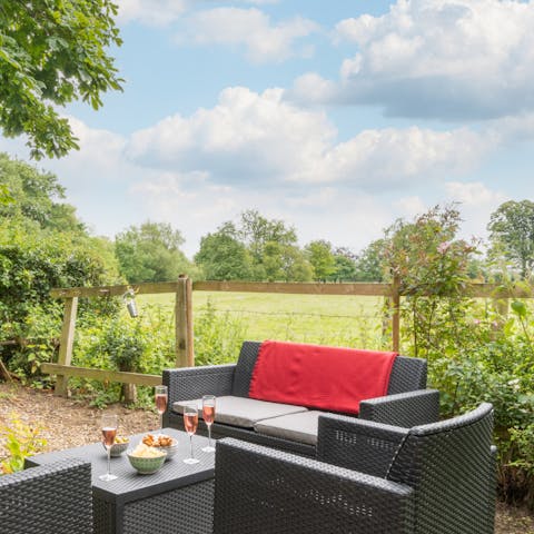 Look out over the neighbouring fields from the peaceful garden
