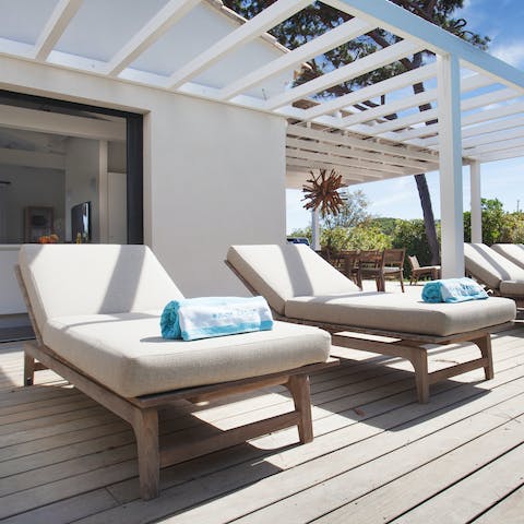 Soak up some sunshine on the poolside loungers
