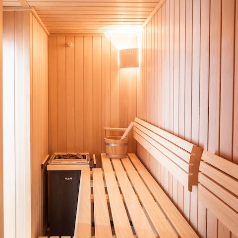 Master the art of relaxation in the private sauna 