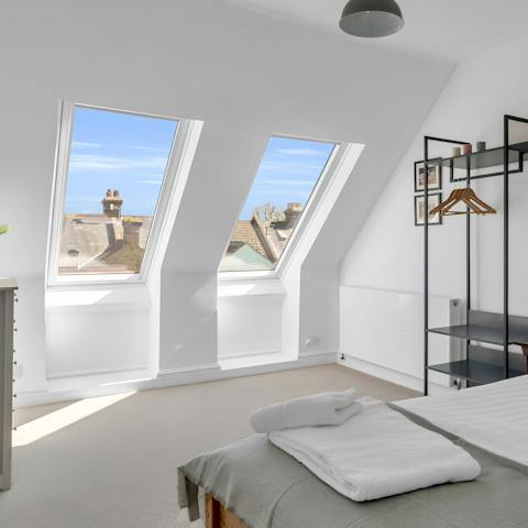 Wake up to plenty of sunlight from the main bedroom's skylights