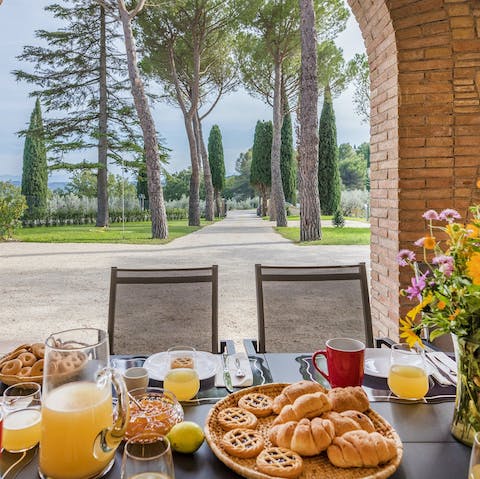 Enjoy breakfasts alfresco around the dining table on the covered terrace
