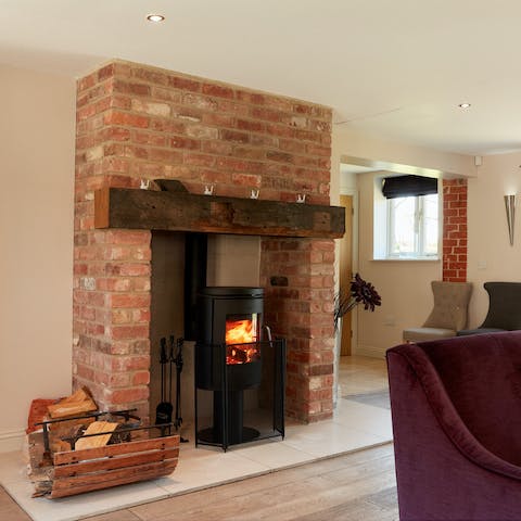 Get a fire crackling in the wood-burning stove for cosiness