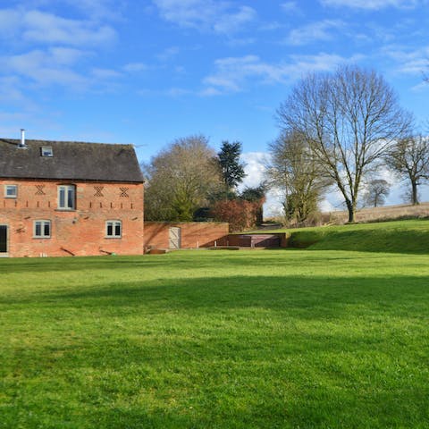 Let the kids run free on the huge lawns that surround this home