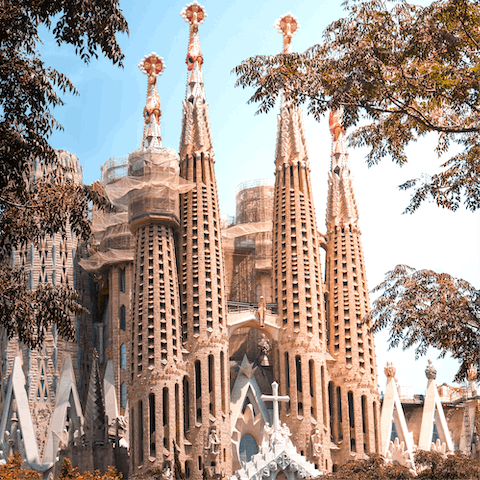 Marvel at La Sagrada Familia, a twelve-minute walk from your apartment