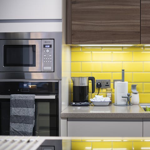  Cook a feast using Neff appliances in the sunshine-yellow kitchen