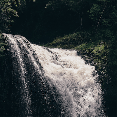 Make a short walk to Stock Ghyll Force, a 70-foot waterfall