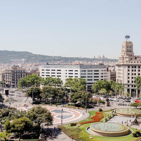 Take in views of Plaça de Catalunya from your terrace – it's just a two-minute stroll from your door