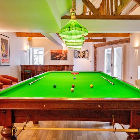 Have a pool, darts or table football match in the games room