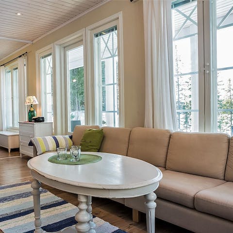 Bask in natural light from floor-to-ceiling windows