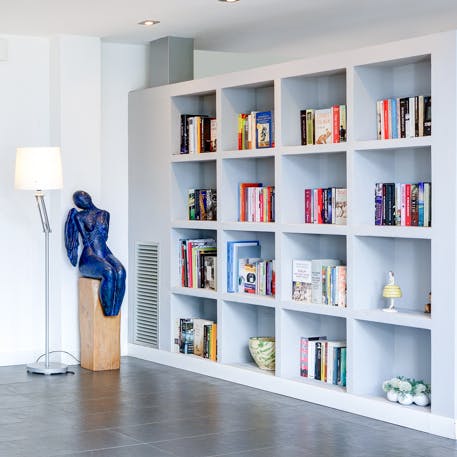 Browse the artistically arranged bookshelves