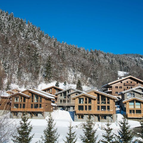 Stay in a sophisticated, small-scale resort on the outskirts of town – it's a ten minute drive to the centre and the ski lift