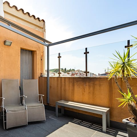 Recline on the sun loungers with your favourite novel on the large terrace