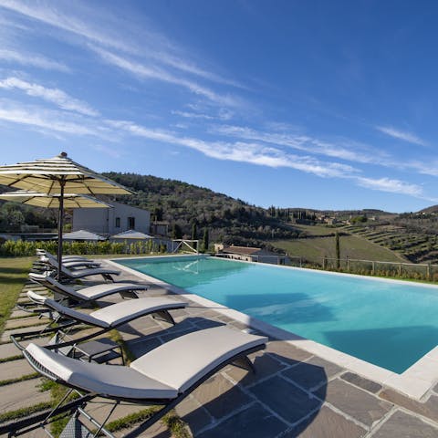 Soak up the sun from in or beside one of the private pools