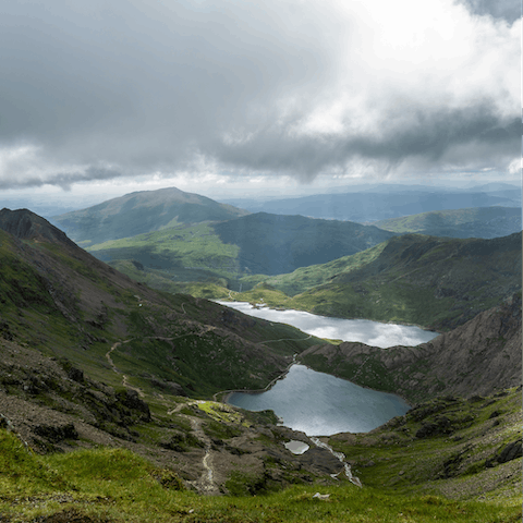 Hike through the wilds of Snowdonia National Park, approximately 25 miles away