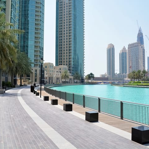 Stroll along Dubai Marina, soaking in the surroundings – only a sixteen-minute drive away
