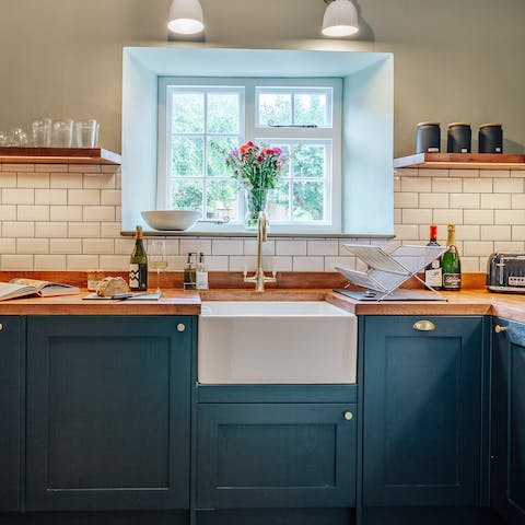 Experience the joy of cooking in the cottage kitchen – complete with a Belfast sink
