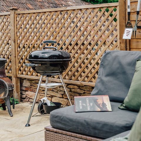 Fire up the barbecue and relax on the comfortable outdoor lounge set