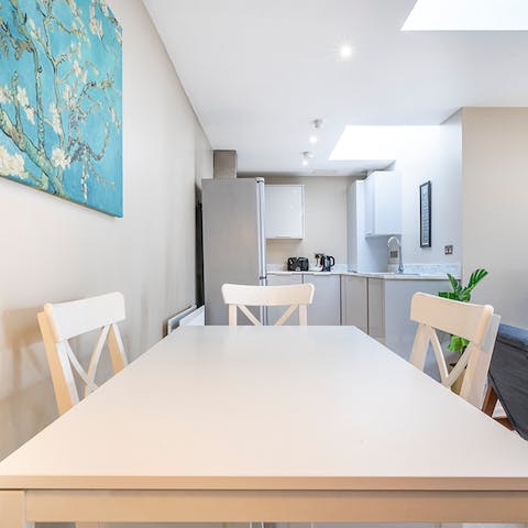 Enjoy group breakfasts in the open kitchen and dining area