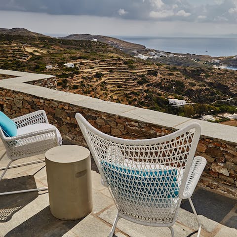 Sit on the terrace and admire the Cycladic beauty that surrounds the villa 