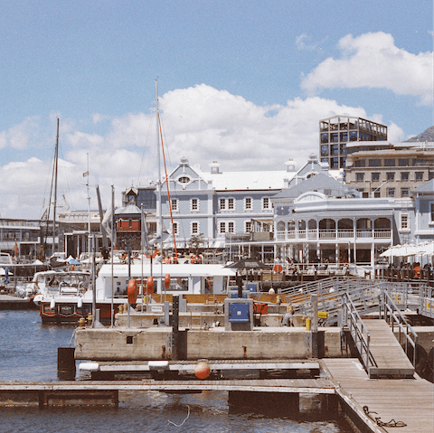 Visit the iconic V&A Waterfront, soaking up the sea and mountain views as you shop