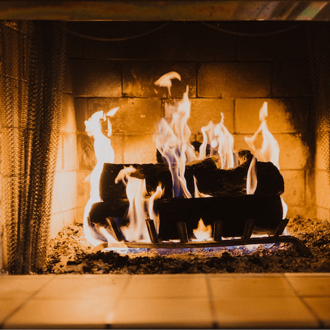 Share an intimate night around the open-heart fireplace