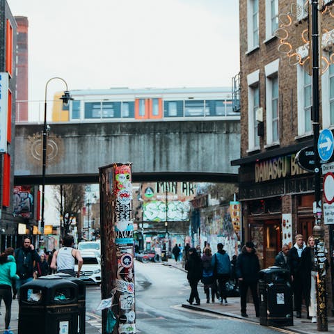 Walk through the bustling streets of trendy Shoreditch that surround the apartment building