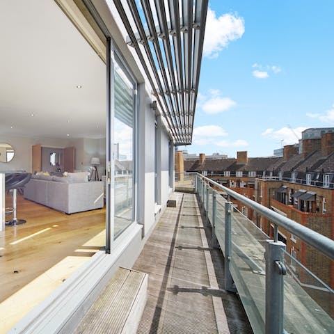 Get some fresh air and admire the view from the private balcony