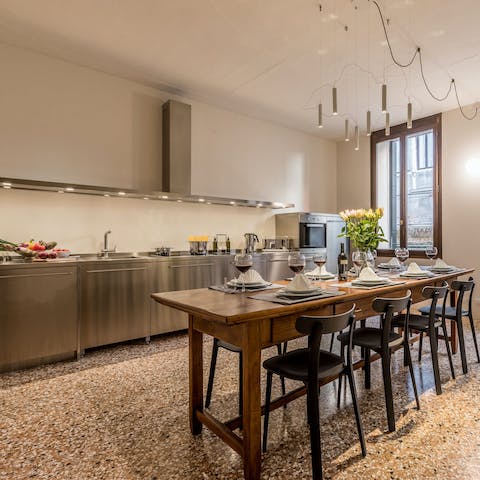 Prepare a spread of Italian dishes in the sleek kitchen