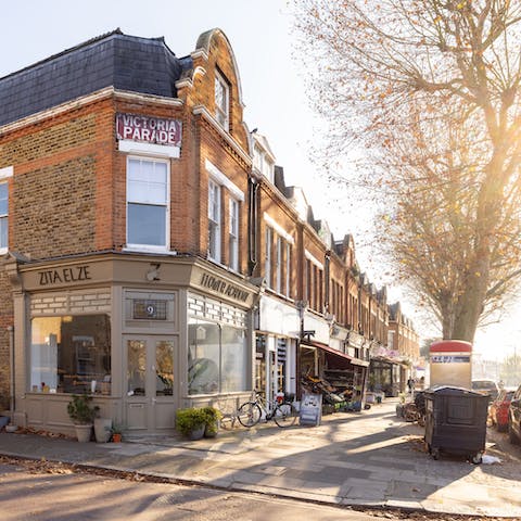 Explore Kew's charming streets lined with independent cafes, cosy pubs and local shops
