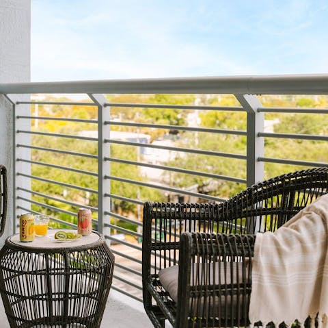 Enjoy a coffee and a snack on the private balcony 