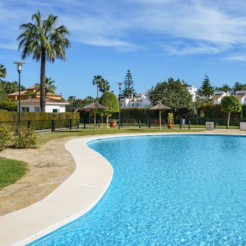 Enjoy a refreshing dip in the communal swimming pool