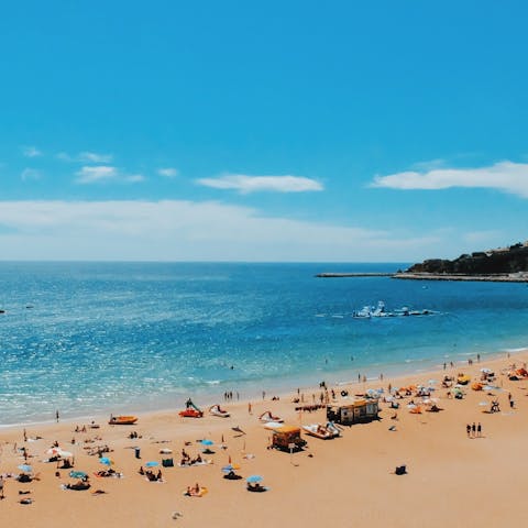 Stretch out on the sands of Praia do Peneco, a six-minute stroll away