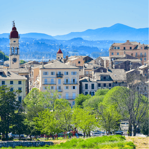 Hop on a bus to Corfu Town to sip cocktails and dine out