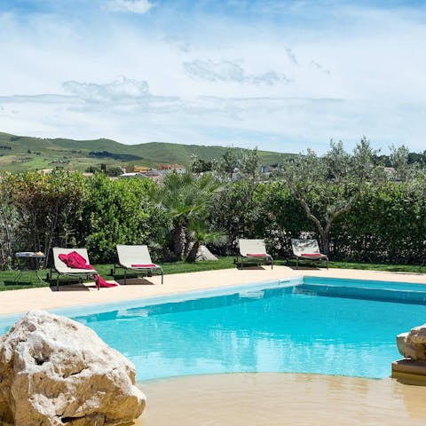 Soak up the sun by the private pool 