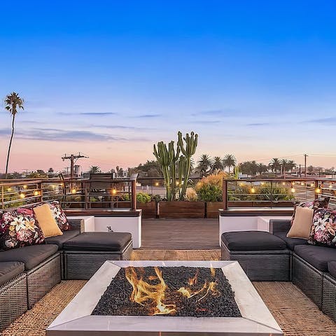 Spend the evening chilling on the rooftop terrace by the firepit