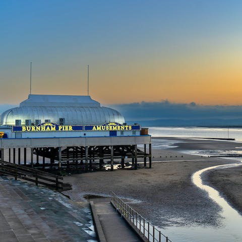 Head to Burnham-on-Sea's pier for good old-fashioned fun, a short drive away