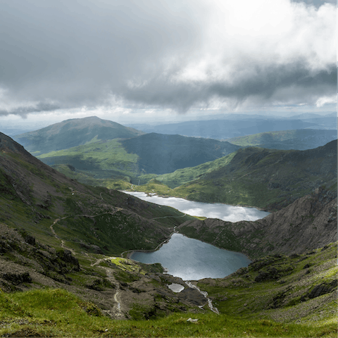 Lace up your hiking boots and explore Snowdonia National Park on foot – it's a thirty-two-minute drive