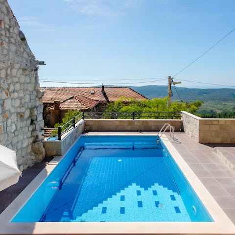 While away sunny afternoons taking dips in the private pool